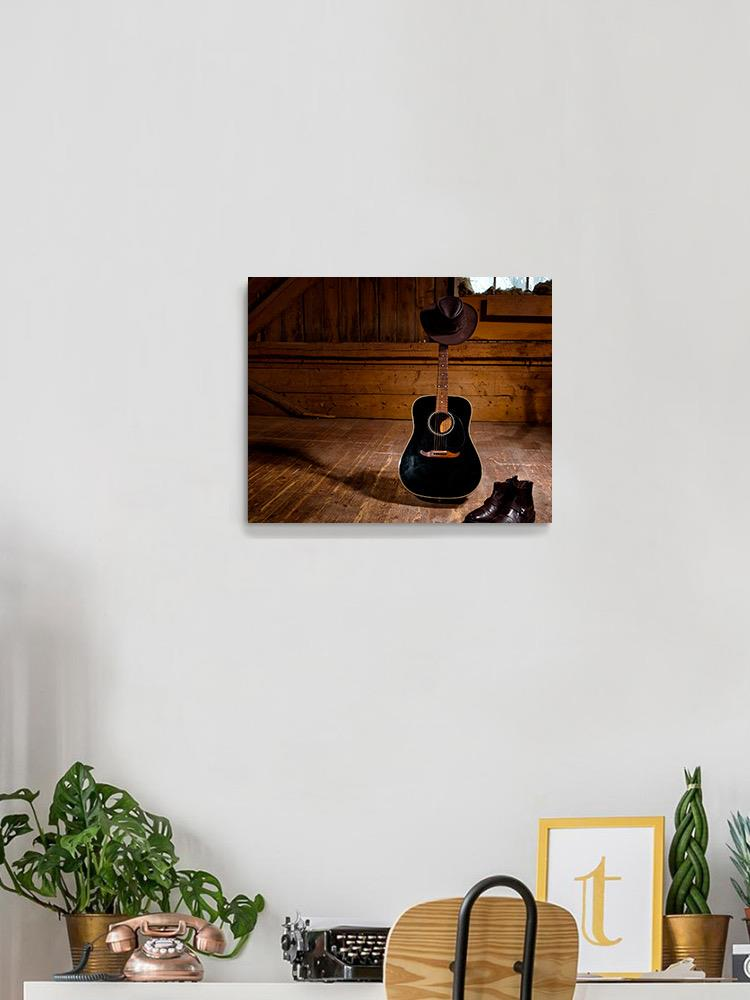 Guitar With Hat And Boots Wrapped Canvas -Image by Shutterstock