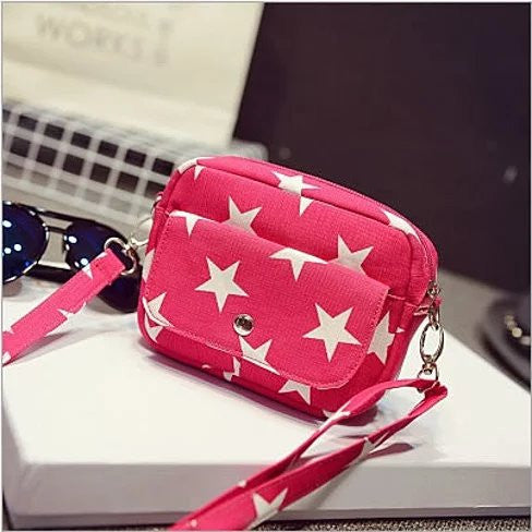 Multi Starrer Movie Night Wristlet And Cross Body Bag